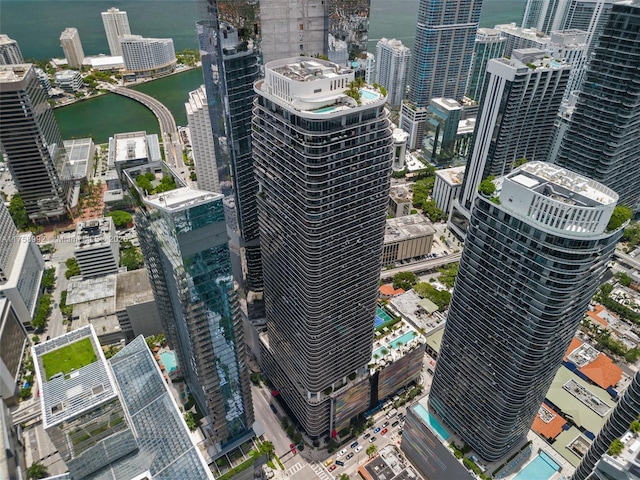 bird's eye view featuring a water view and a city view