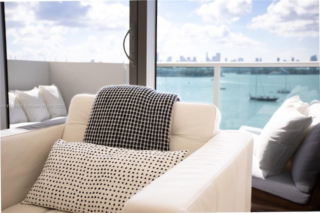 balcony with a view of city and outdoor lounge area