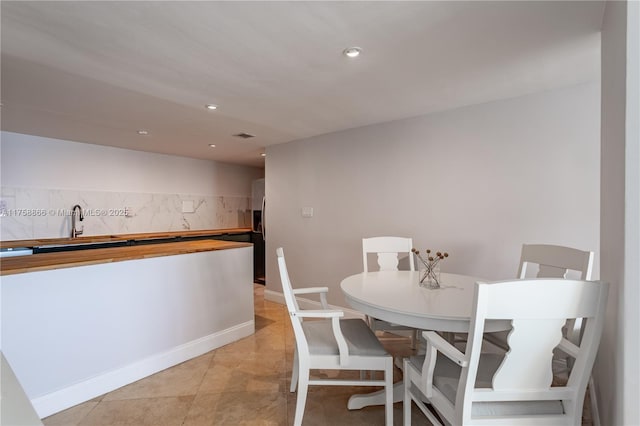 dining space with recessed lighting, visible vents, and light tile patterned floors