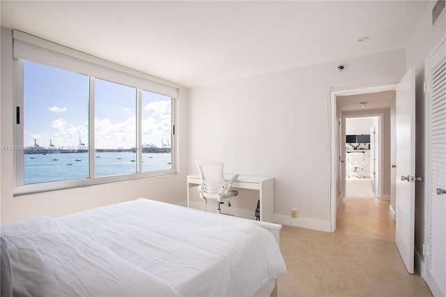 bedroom with visible vents and baseboards