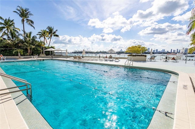 community pool with a patio