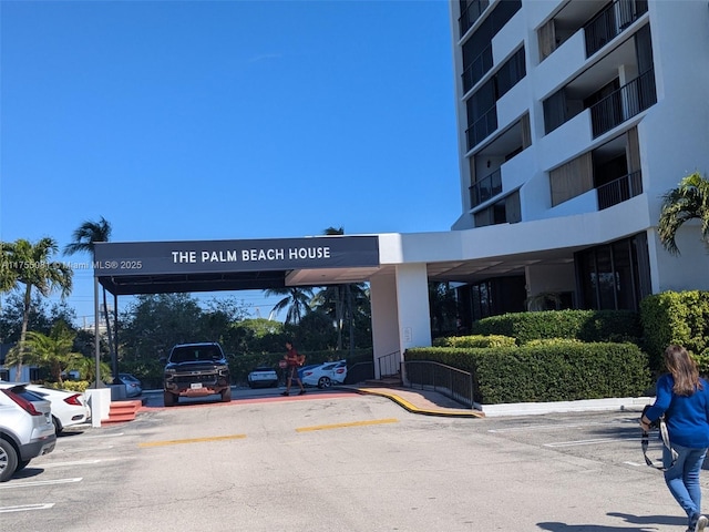 view of property with uncovered parking