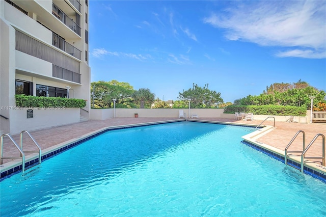 community pool featuring a patio