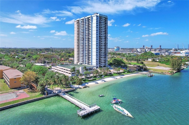 bird's eye view featuring a view of city and a water view