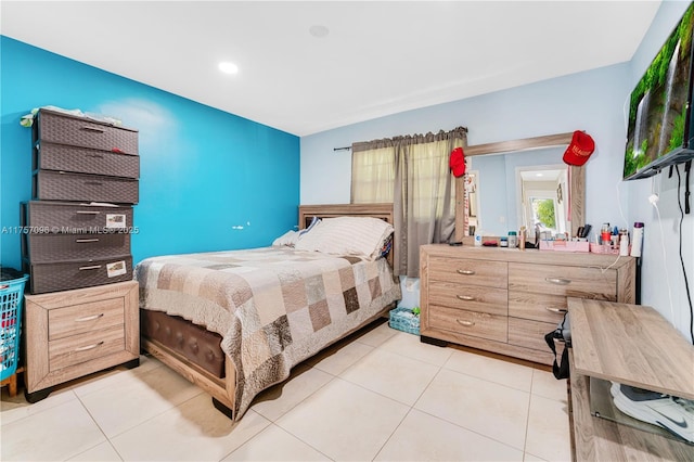 bedroom featuring light tile patterned flooring