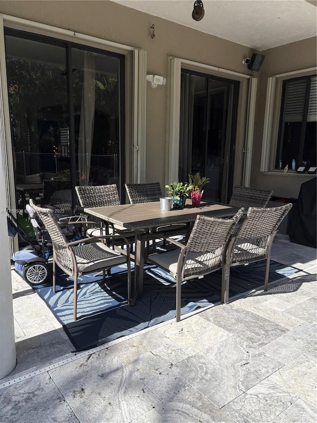 view of patio with outdoor dining space