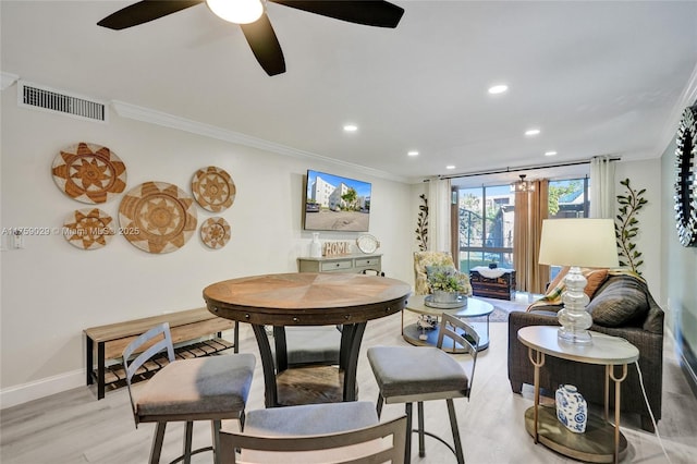 interior space with recessed lighting, visible vents, crown molding, and baseboards