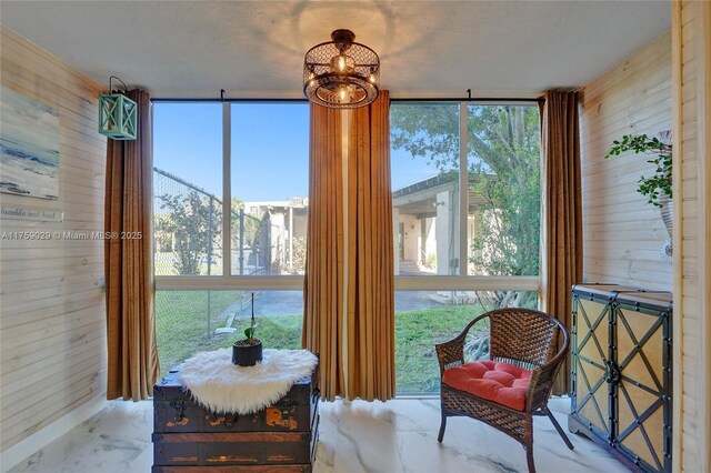 sunroom featuring a wealth of natural light