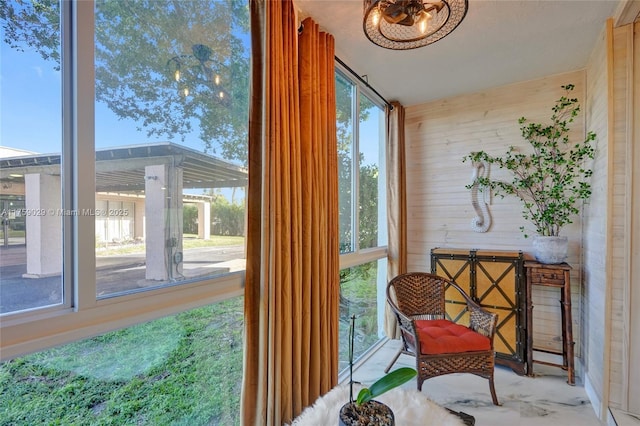 sunroom featuring a wealth of natural light