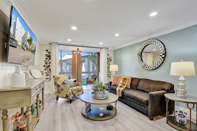 living area featuring ornamental molding, wood finished floors, and recessed lighting