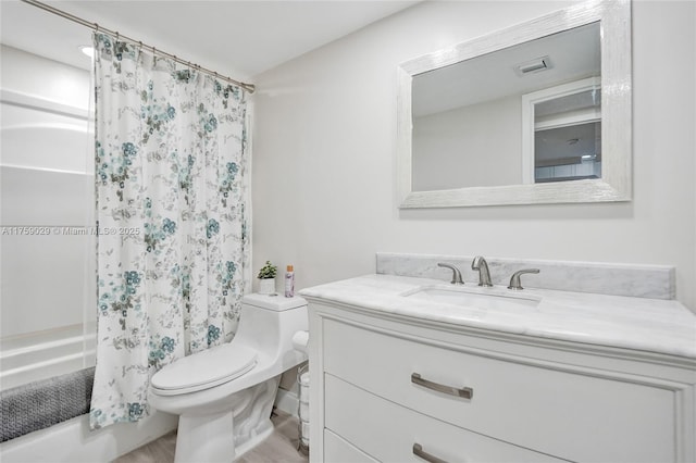 bathroom featuring visible vents, shower / bathtub combination with curtain, toilet, and vanity