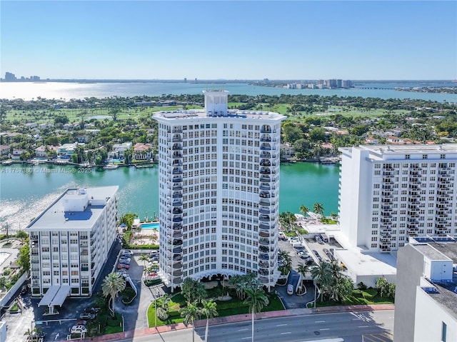 bird's eye view featuring a water view and a view of city