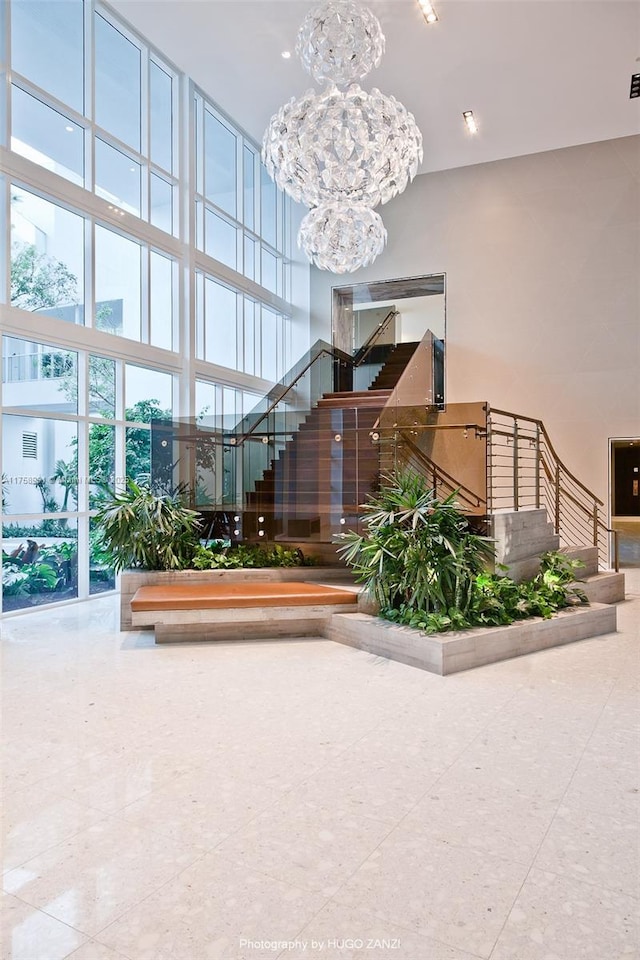 2020 N Bayshore Dr Unit Th 104, Miami, FL 33137 - community lobby featuring a towering ceiling and stairway