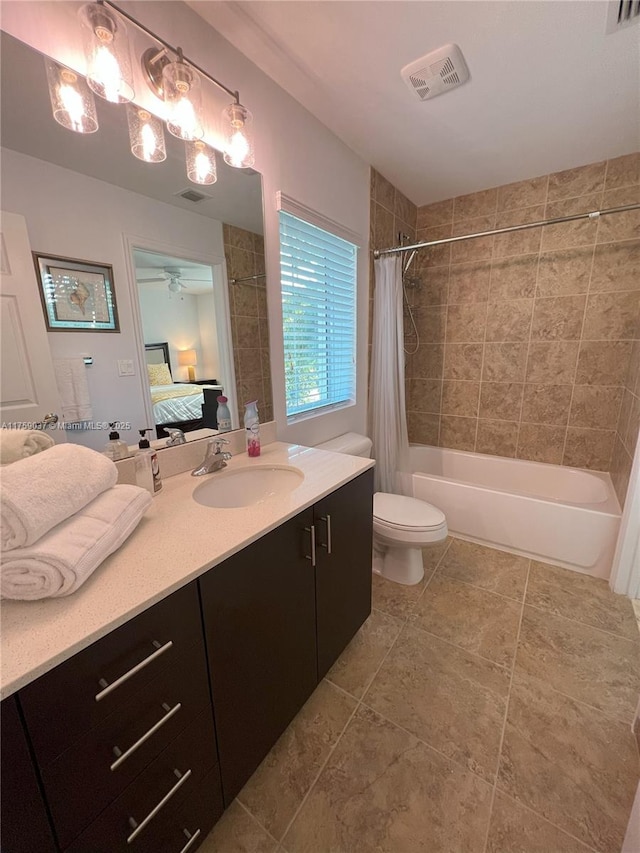 ensuite bathroom featuring ensuite bath, visible vents, shower / bath combo with shower curtain, and vanity