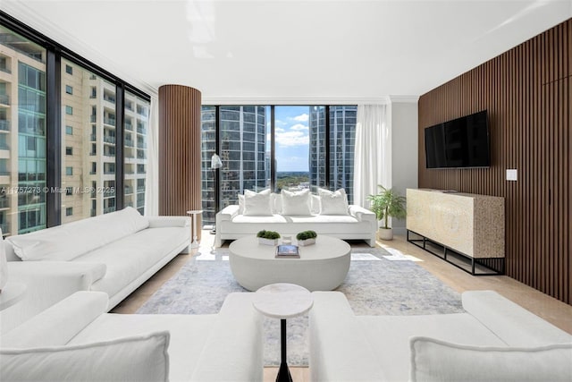 living room featuring a wall of windows