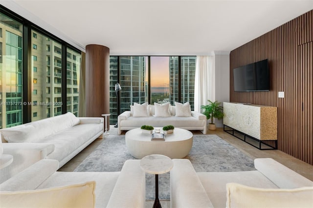 living room featuring floor to ceiling windows