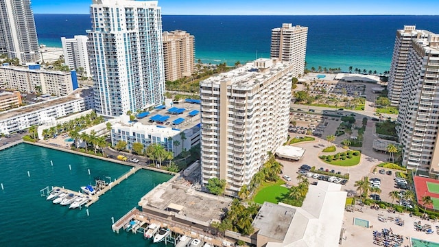 drone / aerial view with a view of city and a water view