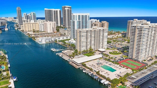 aerial view with a view of city and a water view