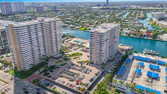 drone / aerial view with a view of city and a water view