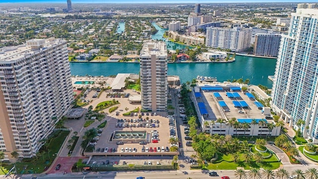 aerial view featuring a water view and a city view