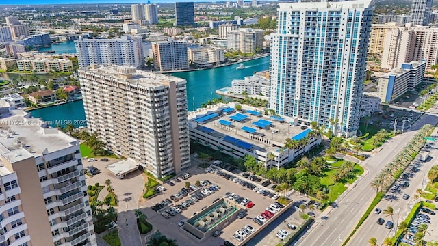 drone / aerial view with a water view and a city view