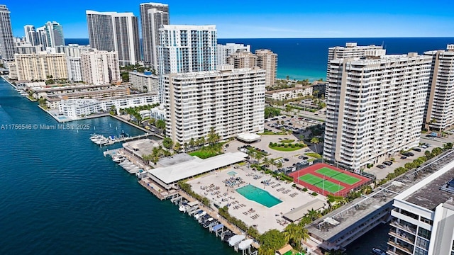 aerial view featuring a water view and a city view