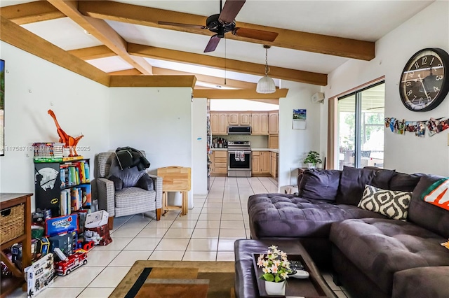 living room featuring lofted ceiling with beams, light tile patterned flooring, and ceiling fan