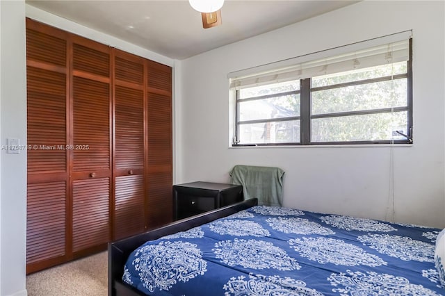 bedroom featuring a closet and a ceiling fan