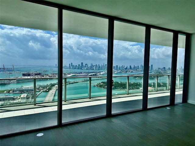 balcony with a city view and a water view