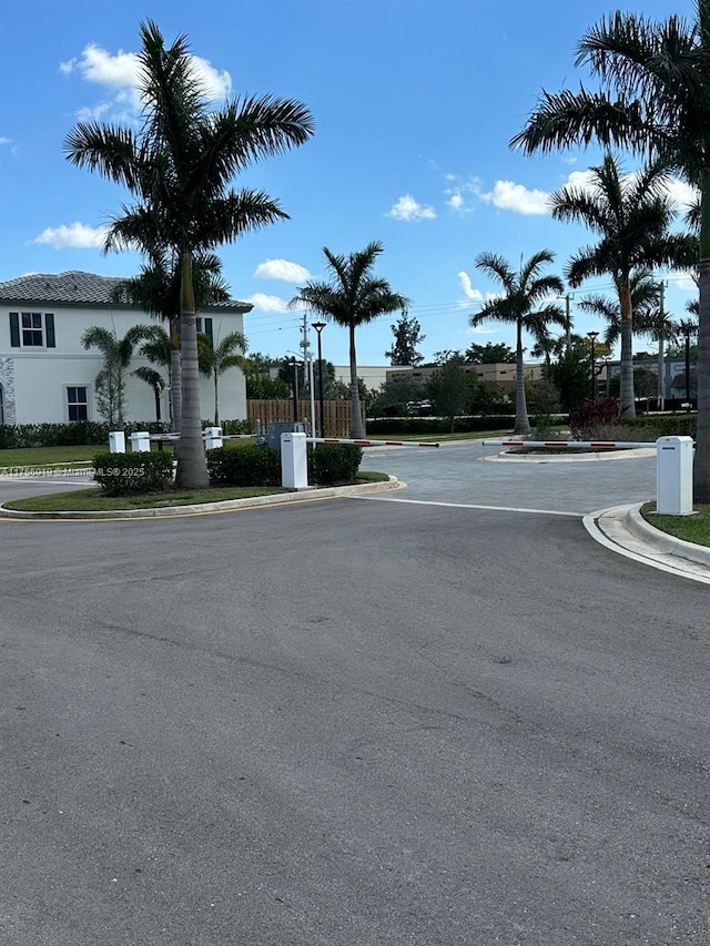 view of street with curbs and street lighting