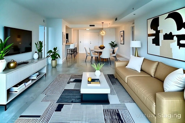 3400 SW 27th Ave Unit 705, Miami, FL 33133 - living room featuring baseboards