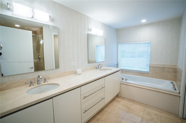 3400 SW 27th Ave Unit 705, Miami, FL 33133 - full bathroom featuring double vanity, a bath, and a tile shower