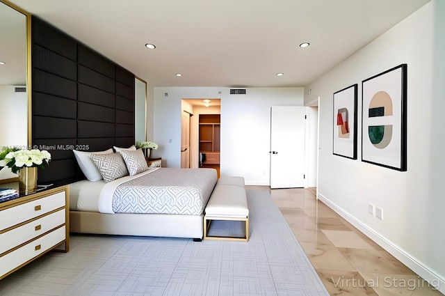 3400 SW 27th Ave Unit 705, Miami, FL 33133 - bedroom with recessed lighting, baseboards, and a spacious closet