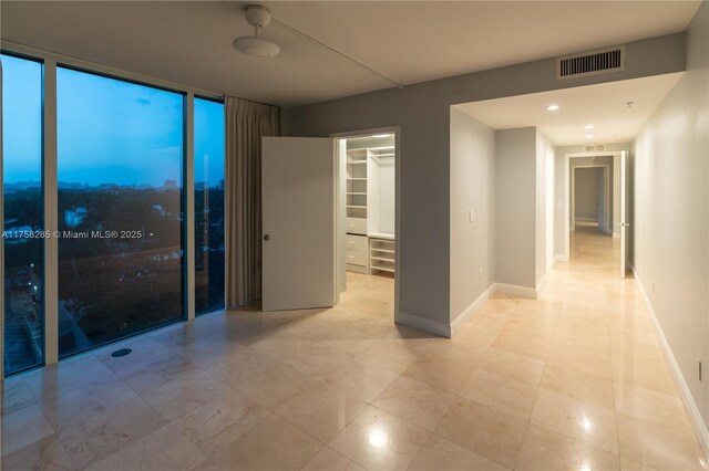 3400 SW 27th Ave Unit 705, Miami, FL 33133 - empty room with baseboards