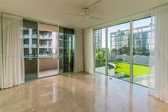 3400 SW 27th Ave Unit 705, Miami, FL 33133 - spare room featuring ceiling fan