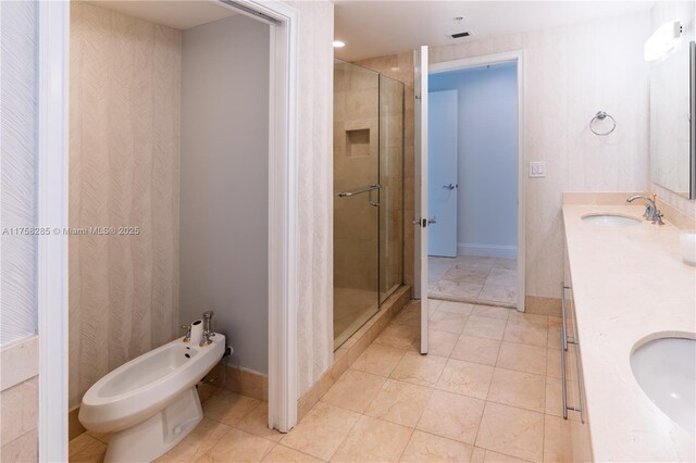 3400 SW 27th Ave Unit 705, Miami, FL 33133 - bathroom with a bidet, a stall shower, double vanity, and baseboards