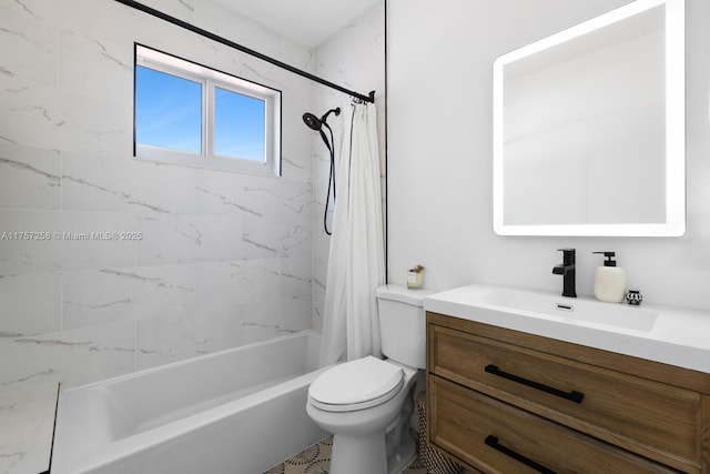 bathroom featuring shower / tub combo, vanity, and toilet