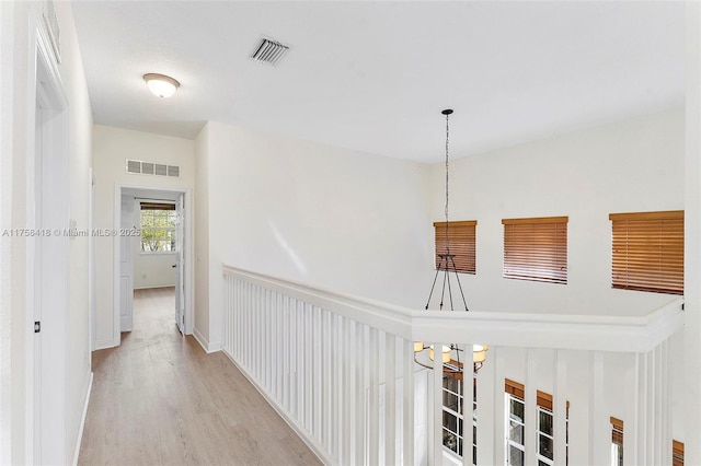 5220 SW 139th Ter, Miramar, FL 33027 - hall with a chandelier and light wood finished floors