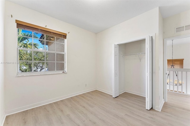 5220 SW 139th Ter, Miramar, FL 33027 - unfurnished bedroom with light wood-type flooring and a closet