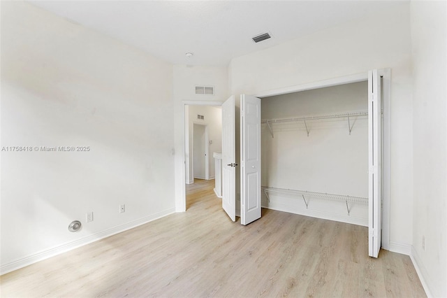 5220 SW 139th Ter, Miramar, FL 33027 - unfurnished bedroom with light wood-type flooring and a closet