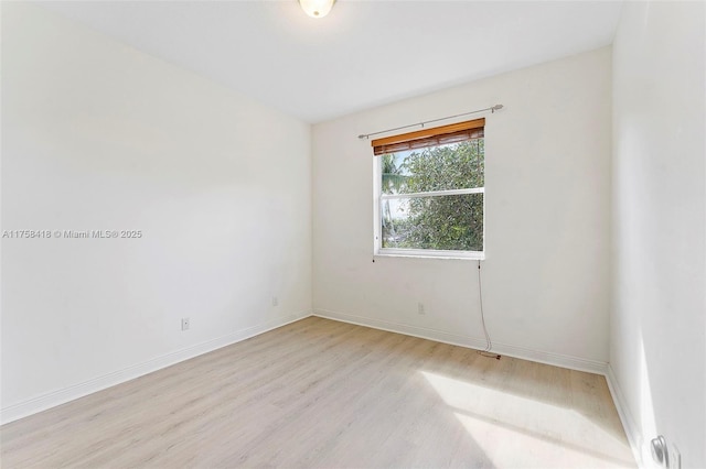 5220 SW 139th Ter, Miramar, FL 33027 - empty room with light wood-type flooring and baseboards