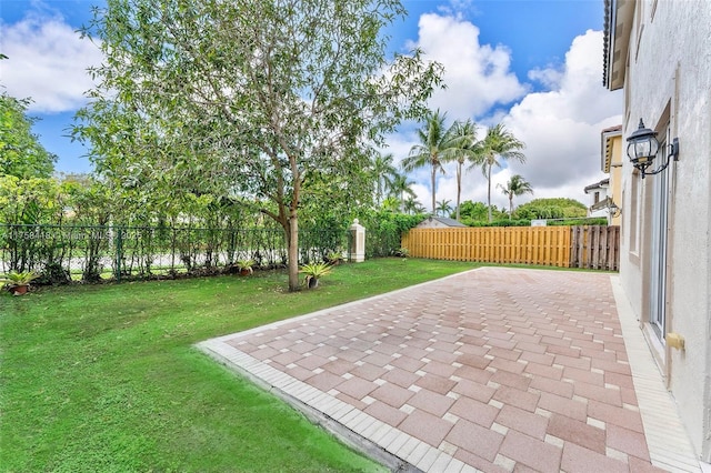 5220 SW 139th Ter, Miramar, FL 33027 - fenced backyard with a patio