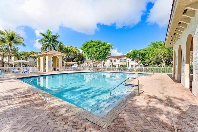5220 SW 139th Ter, Miramar, FL 33027 - community pool featuring a patio