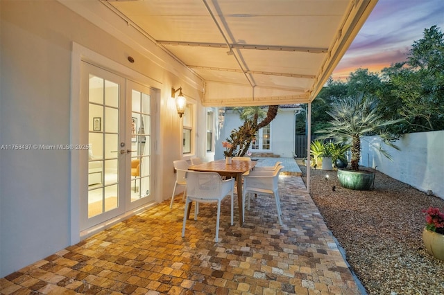 view of patio featuring french doors and outdoor dining space