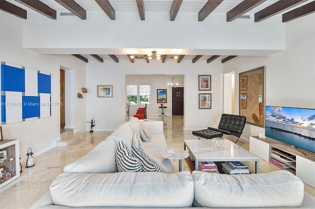 living area featuring marble finish floor, baseboards, a notable chandelier, and beamed ceiling