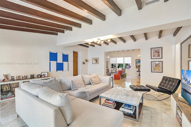 living room featuring beam ceiling, visible vents, and wooden ceiling