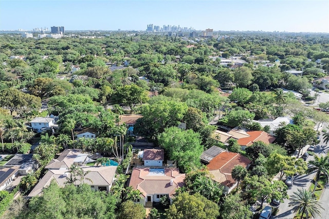 birds eye view of property with a city view