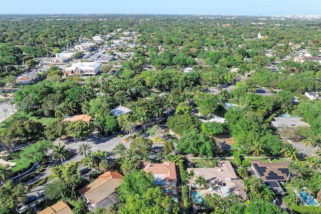 aerial view with a residential view and a wooded view