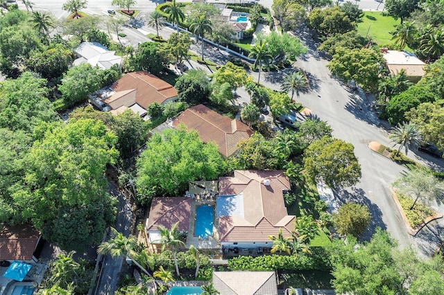 birds eye view of property with a residential view