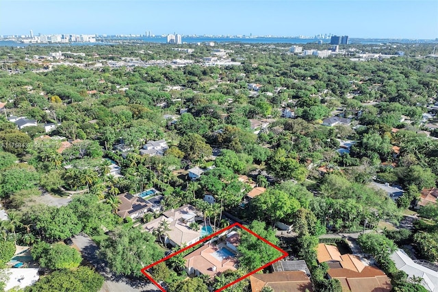 birds eye view of property with a view of city